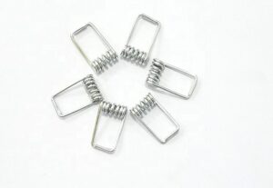 Clothespin torsion spring