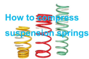 how to compress suspension springs